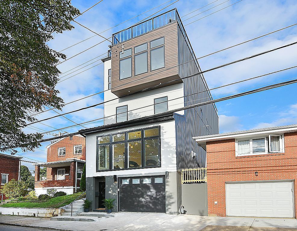 37th Street Residence in Lawrenceville Pittsburgh — four-story modern infill new home built on a tiered hillside lot, designed and built by Incline Homes.