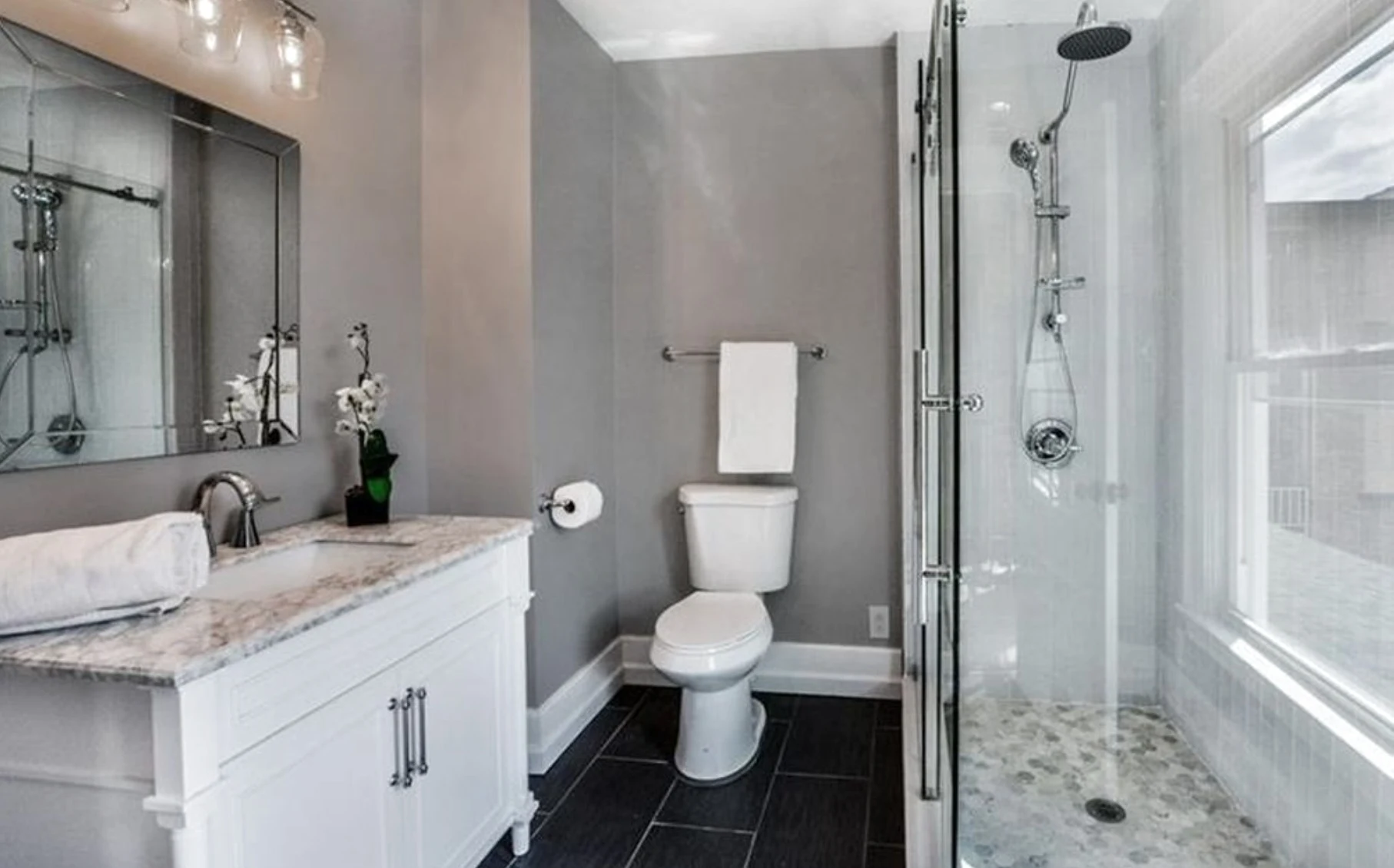 Primary bath &mdash; glass-enclosed walk-in shower