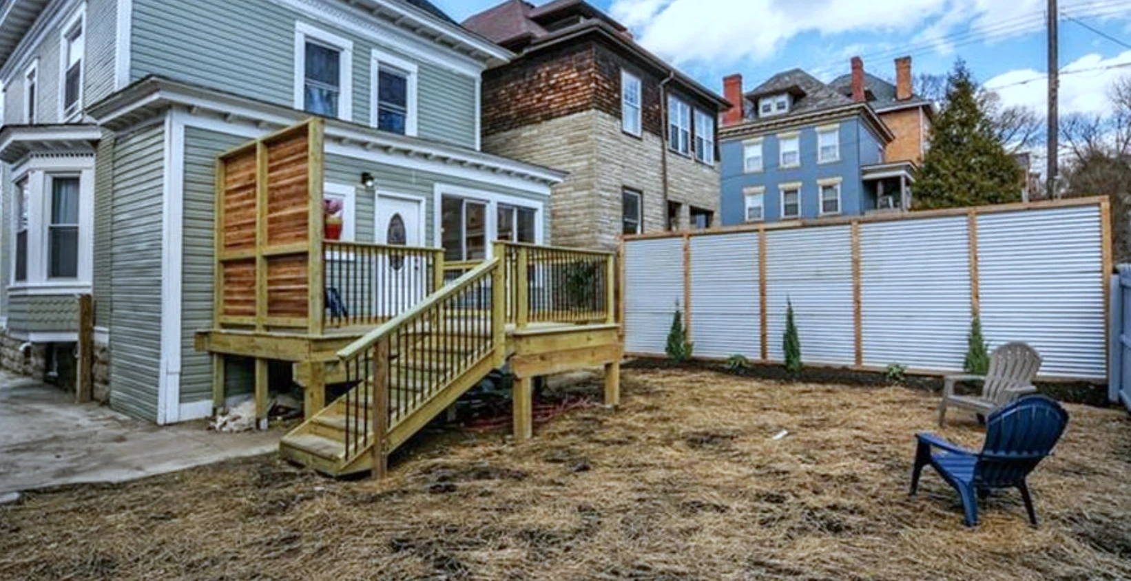 New back deck — cedar privacy screen and fenced yard