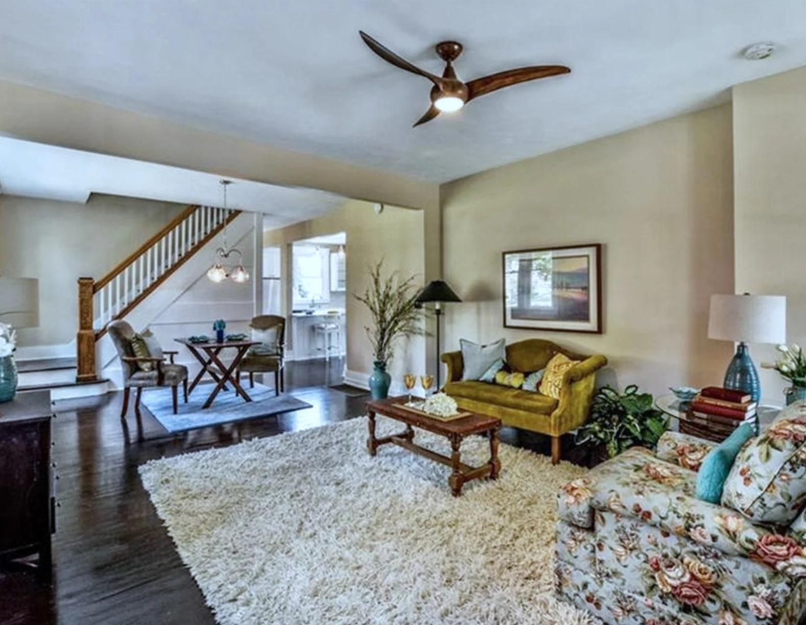 Living room &mdash; dark hardwood and original room rhythm