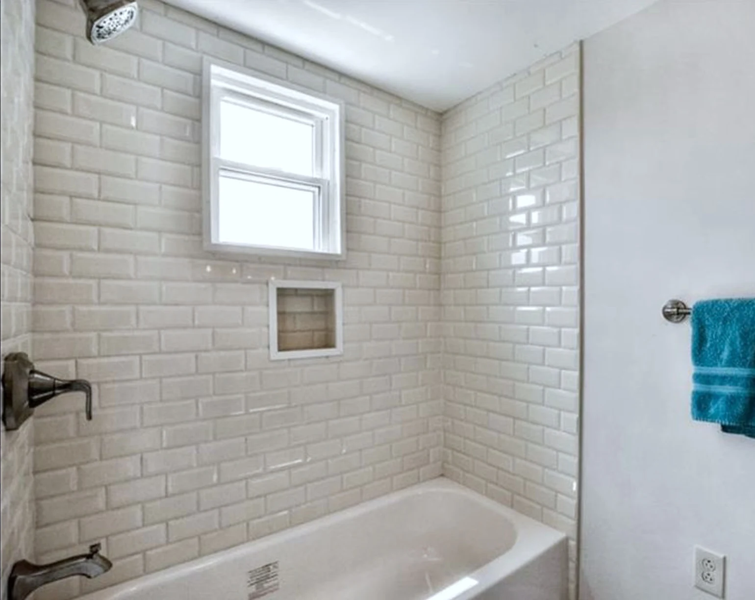 Hall bath &mdash; classic subway tile and alcove tub