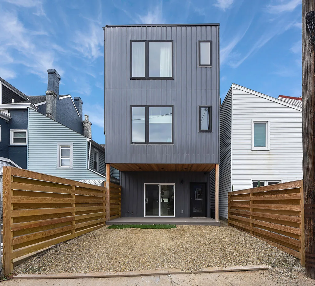 Modern Pittsburgh home with a full second story added above the original footprint