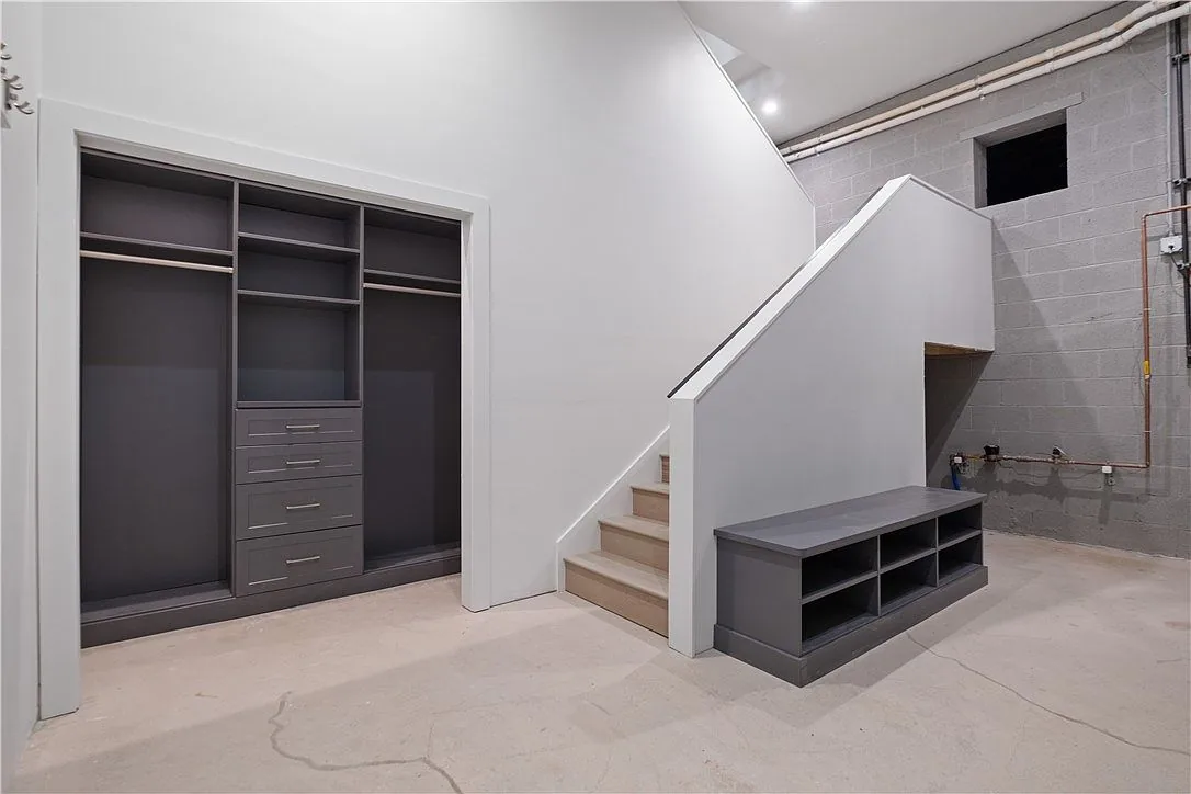 Finished Pittsburgh basement with new flooring and recessed lighting